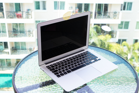 Close up blocks the covered webcam with a white sticker tape.の写真素材