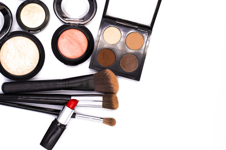 set of professional decorative cosmetics, makeup tools and accessory on white background with copy space for text. beauty, fashion, party and shopping concept. flat lay frame composition, top view.の写真素材