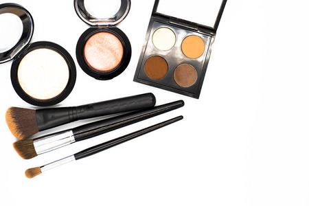 set of professional decorative cosmetics, makeup tools and accessory on white background with copy space for text. beauty, fashion, party and shopping concept. flat lay frame composition, top view.の写真素材