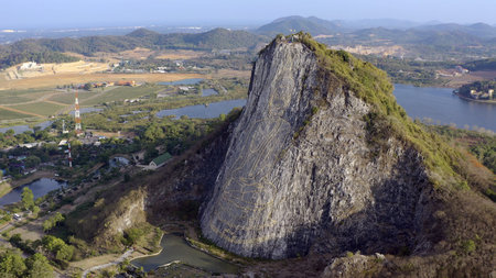 Buddha images the carved On the mountain. Buddha Mountain in pattaya Thailand.