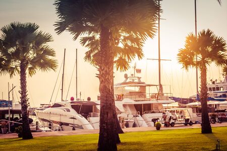 Pattaya, Thailand - May 28, 2019: Luxurious Yachts Docked At The Pier. Tropic resort at sunsetのeditorial素材