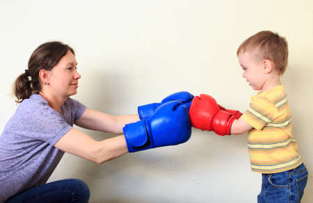 Boxing match. mother and son in a Boxing matchの写真素材