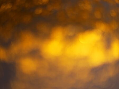 golden glitter sparkle on black background. Isolated. Flat lay. Christmas background. New year decoration. wallpaper. Copy space. Blurの写真素材