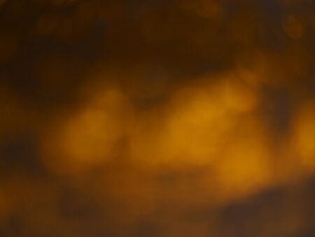 golden glitter sparkle isolated on black backgroundの写真素材