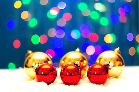 Fir brunch on sparkling background with place for text. New year decoration. Lights