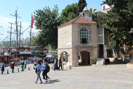 Tourist port in Antalya. Old city. People walk in the square. Tourism.のeditorial素材