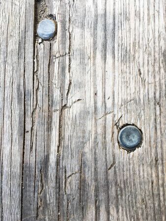 Old wooden board with nails. Wood texture. Close-up.の写真素材
