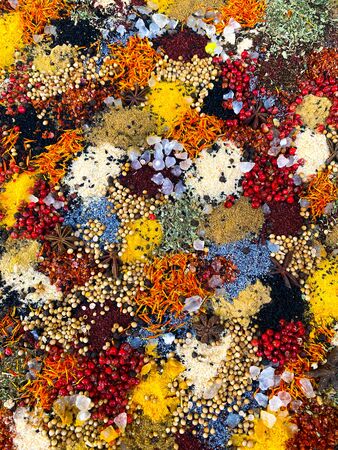 Background from colored spices. Turkish national seasoning.の写真素材