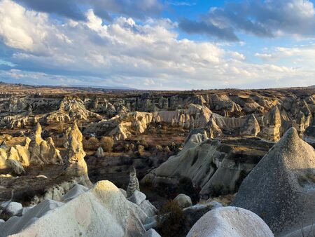 View of a valley filled with ancient rock formations.の写真素材