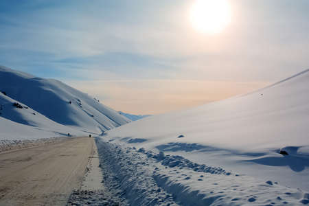 View from the mountains to the Chuy valley, mountains in the snow, soft focusの写真素材