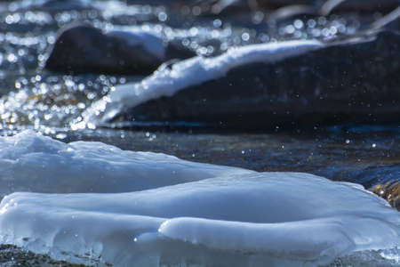 spring ice on a mountain riverの写真素材