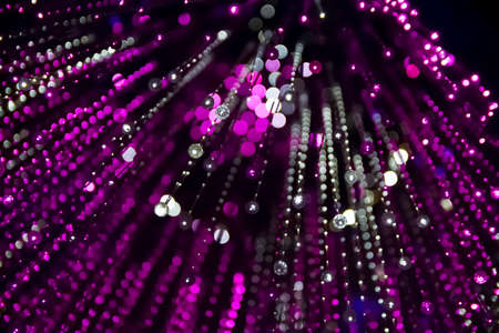 Fantastically beautiful blurred chandelier, bright bokeh, selective focusの写真素材
