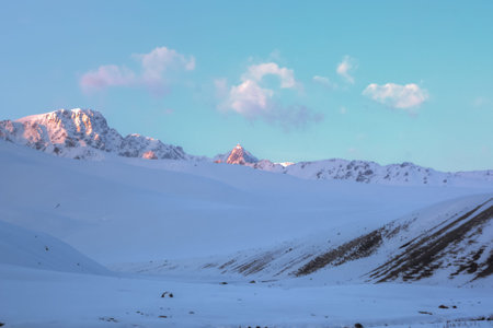 Snowy peaks in the Suusamyr valley Kyrgyzstanの写真素材