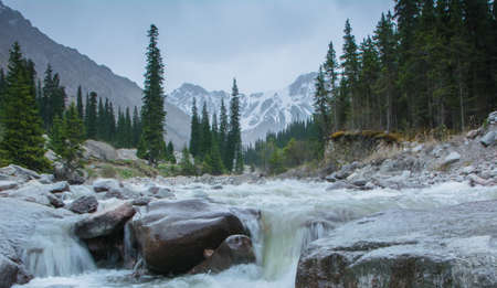 Rough mountain river in the Barskoon gorge Kyrgyzstan.の写真素材