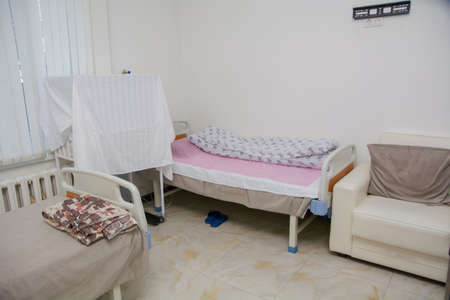 Hospital ward and patient bed after surgery.の写真素材