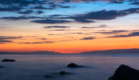 Sunset on the mountain lake Issyk Kul Kyrgyzstan,の写真素材
