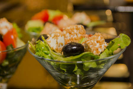 salad for a buffet table, on a gold backgroundの写真素材