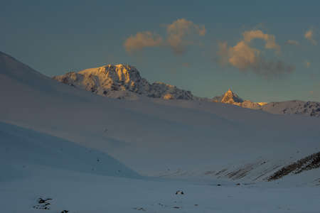 Snowy, high-mountainous Suusamyr valley, mountainous Kyrgyzstan, selective focusの写真素材