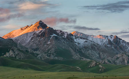 Sunset in the mountains, Naryn region, Kyrgyzstan.の写真素材