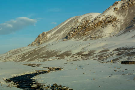 Snowy peaks in the Suusamyr valley Kyrgyzstanの写真素材