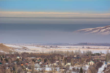 smog over the city of Bishkek, Kyrgyzstanの写真素材