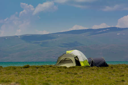 tourist camp in the valley of the mountain lake Son-Kolの写真素材
