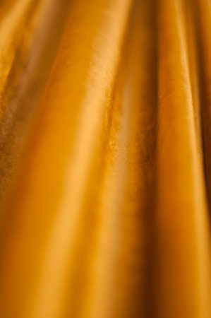 yellow wavy curtains or drapes as background image
