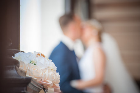 wedding bridal bouquet with wedding rings close-up, background imageの写真素材