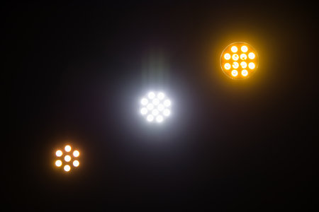 lamp spotlights on the music stage in different colorsの写真素材