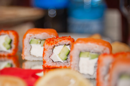 rolls and sushi with red fish on the festive tableの写真素材