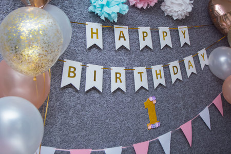 Decoration of a photo zone for birthday, balloons and flasks.