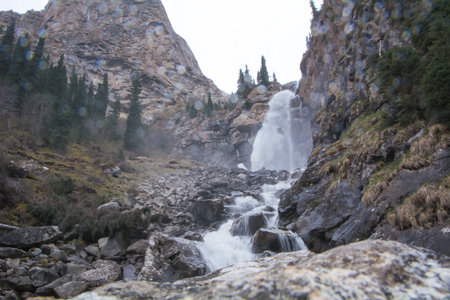 Mountain waterfall in the Barskoon gorge and Jeti-Oguz Kyrgyzstanの写真素材