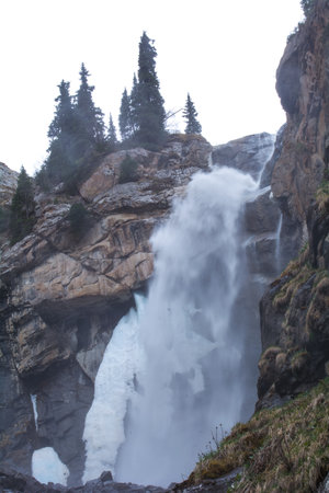 Mountain waterfall in the Barskoon gorge and Jeti-Oguz Kyrgyzstanの写真素材