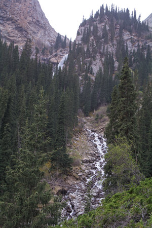 Mountain waterfall in the Barskoon gorge and Jeti-Oguzの写真素材