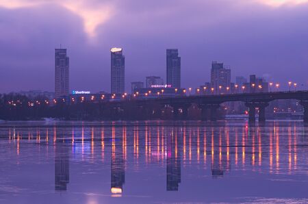 KYIV, UKRAINE-22 January 2017: Sunrise in the city. View to the Paton Bridge and the left bank of the Dnipro.のeditorial素材