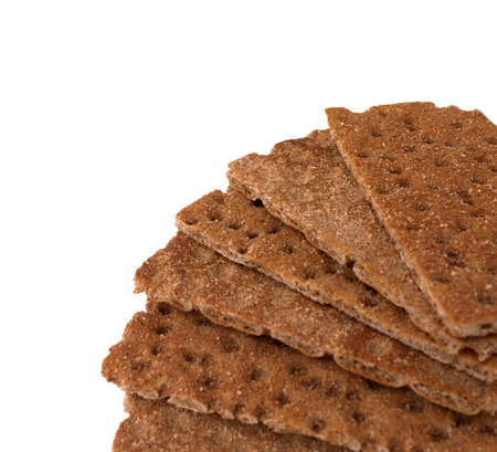 Crispbread with bran macro copy space isolated over whiteの写真素材