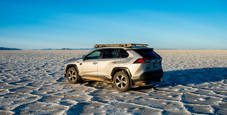 The landscape is an almost perfectly flat, snow-white surface.の写真素材