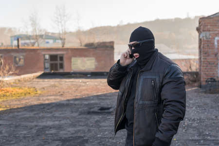 a bandit talking on the phoneの写真素材