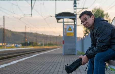 Man sitting on the streetの写真素材