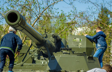 children playing on the military tank
