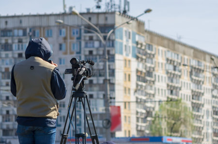 cameraman news agency shoots a report