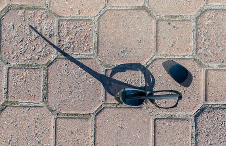 the broken sunglassesの写真素材