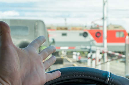 The hand of man inside the carの写真素材