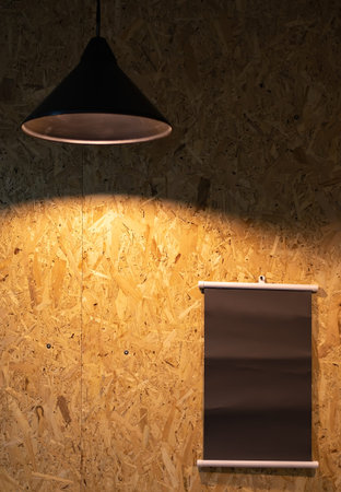 view of a wooden Board at night, illuminated by a lamp