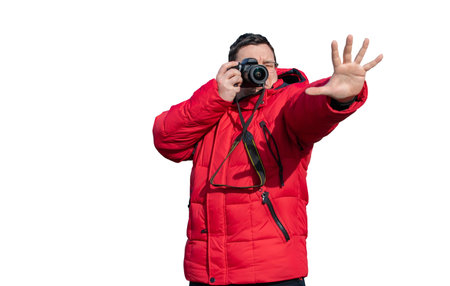 the guy takes photos and holds his hand in front of him