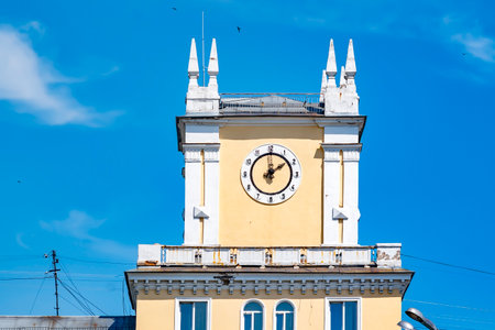 Novokuznetsk city, Russia, 22.07.2021: an old building in the Kuznetsky district of the city with a clockのeditorial素材