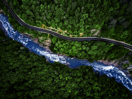Mountain river and road aerial view.の写真素材