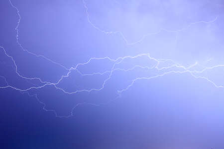 Lightning discharge, during summer storm.の写真素材