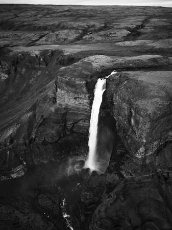 Haifoss waterfall in the highlands of Iceland, Aerial view. Dramatic landscape of Waterfall in Landmannalaugar canyonの写真素材