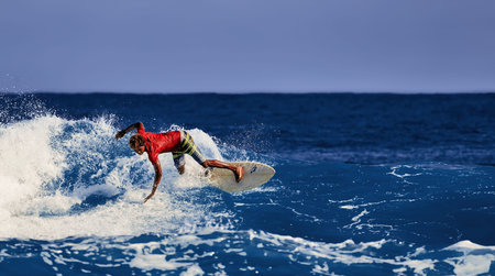Professional surfer, surfing a wave. Water sport activity. Atlantic Ocean Dominican Republic....